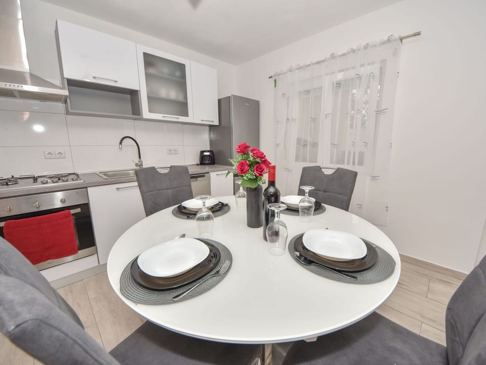 Furniture, Tableware, Table, Chair, Dishware, Cabinetry, Building, Interior Design, Comfort