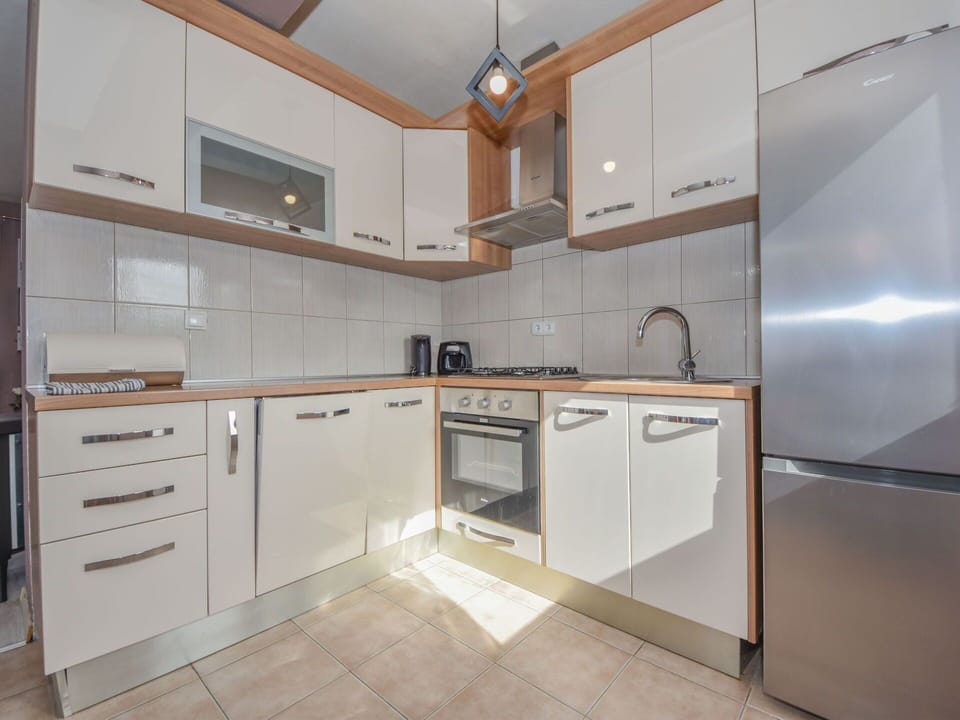 Cabinetry, Countertop, Property, Building, Kitchen Sink, Kitchen Stove, Kitchen Appliance, Sink, Home Appliance, Kitchen