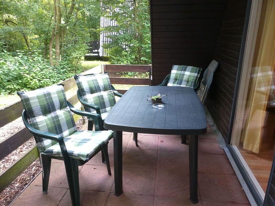 Plant, Furniture, Table, Building, Interior Design, Shade, Wood, Tree, Architecture, Chair