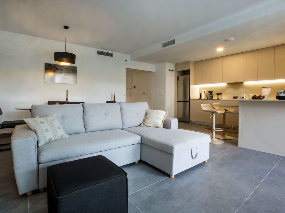 Furniture, Property, Couch, Comfort, Lighting, Interior Design, Pillow, Lamp, Living Room