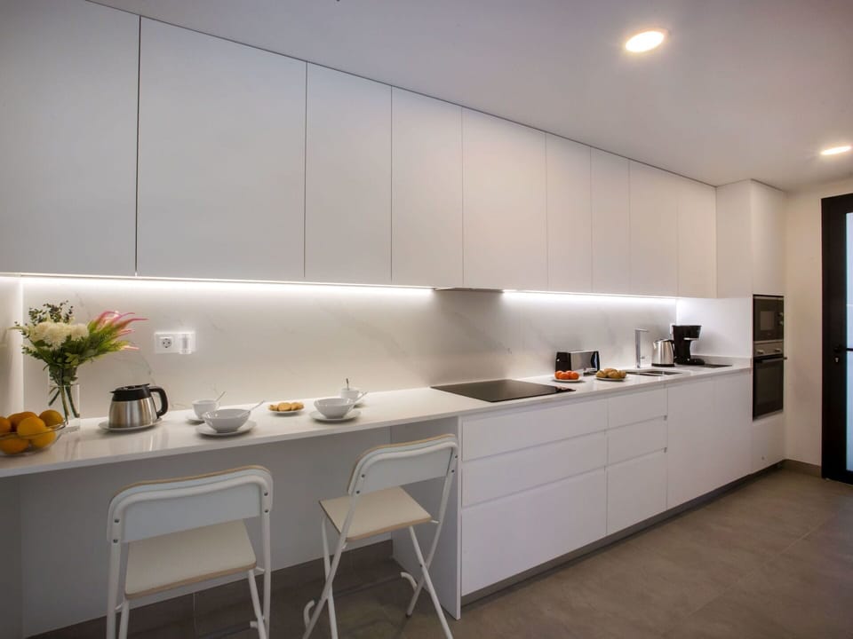 Countertop, Cabinetry, Kitchen, Interior Design, Plant, Flooring, Floor, Wood, Line, Table