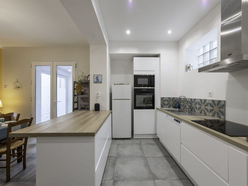 Cabinetry, Furniture, Countertop, Interior Design, Wood, Kitchen, Architecture, Kitchen Appliance, Door