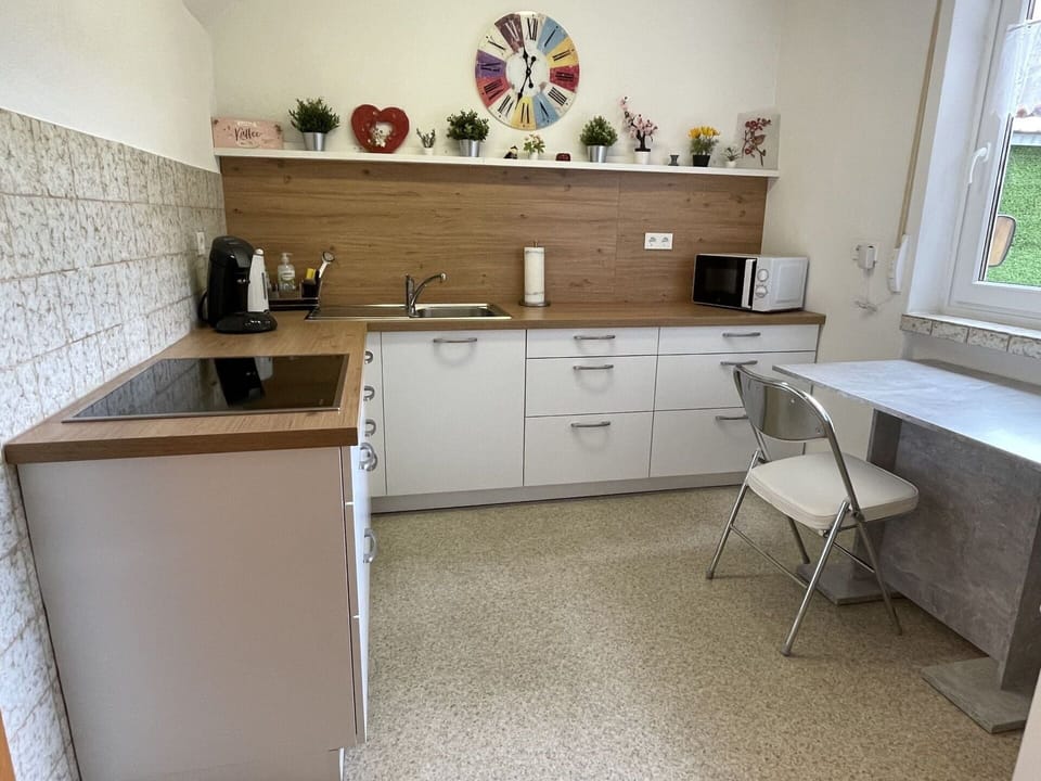 Cabinetry, Countertop, Property, Furniture, Sink, Window, Kitchen, Wood, Kitchen Sink, Drawer