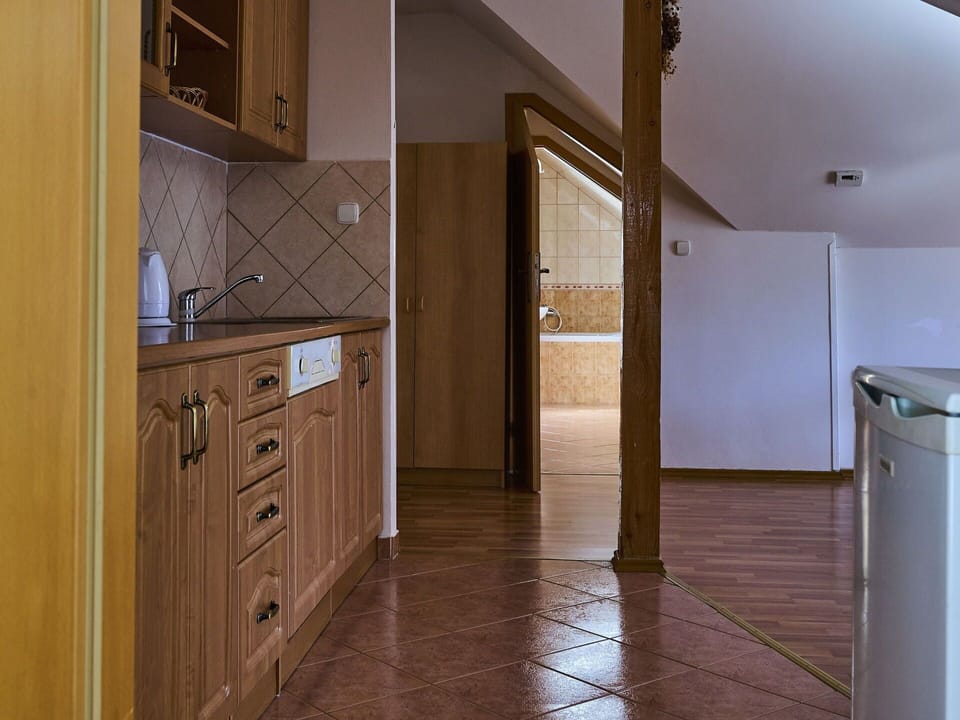 Cabinetry, Wood, Building, Countertop, Interior Design, Kitchen, Floor, Drawer, Flooring