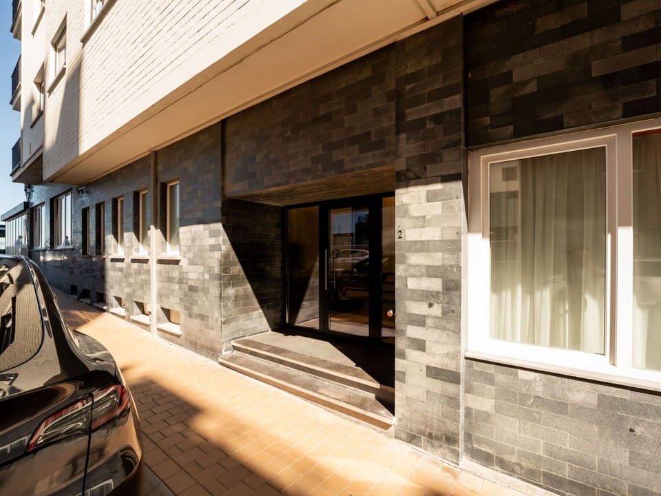 Building, Window, Car, Automotive Design, Wood, Automotive Exterior, Real Estate, Facade, Asphalt