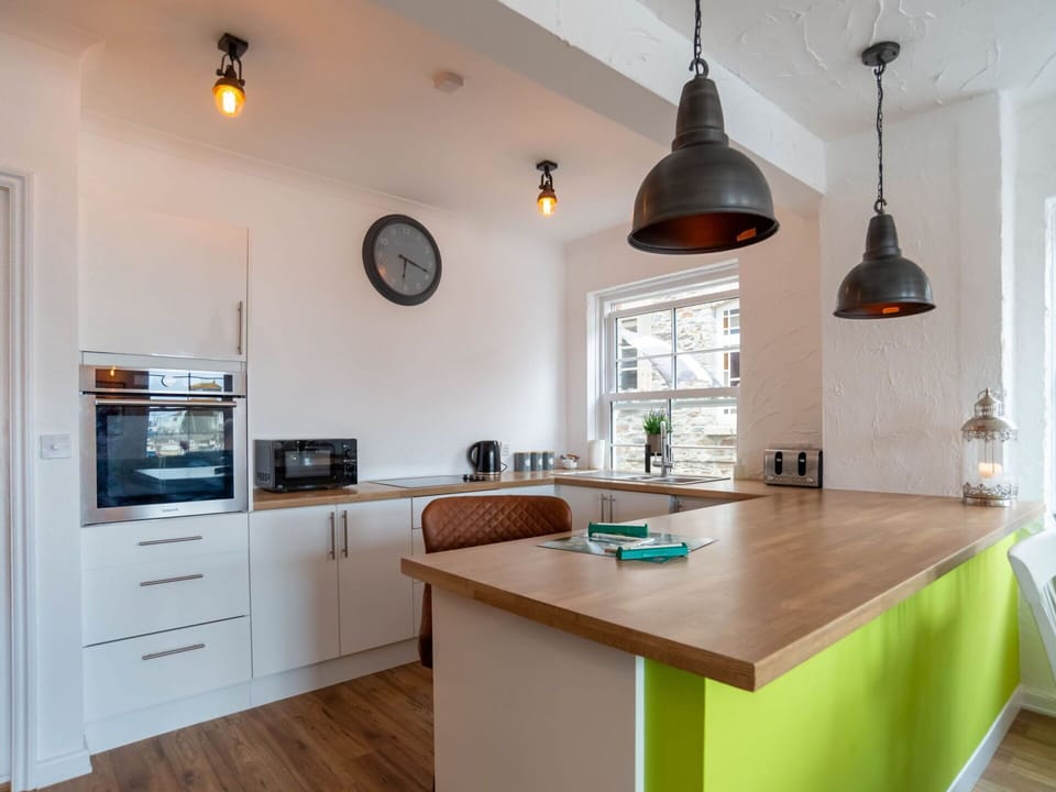 Cabinetry, Property, Countertop, Wood, Lighting, Interior Design, Window, Floor, Drawer, Kitchen