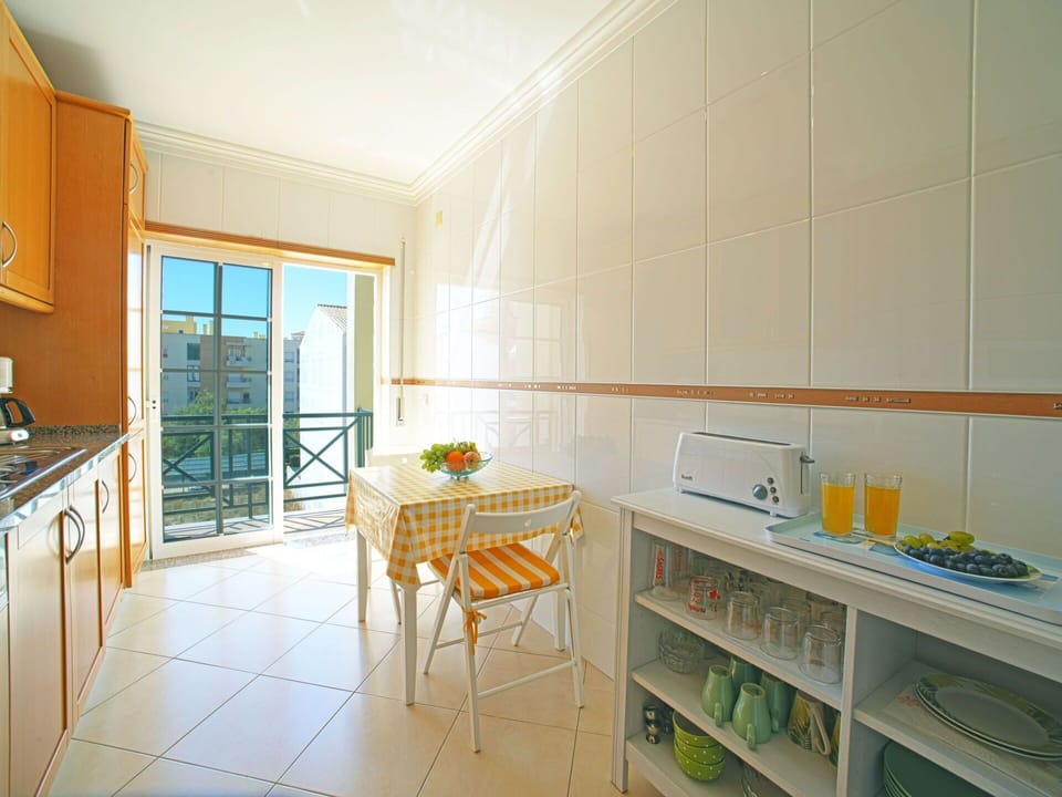 Property, Cabinetry, Kitchen, Countertop, Shelf, Shelving, Interior Design, Wood, Flooring, Floor
