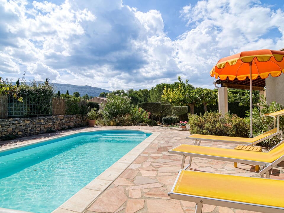 Cloud, Water, Plant, Sky, Swimming Pool, Azure, Outdoor Furniture, Architecture, Shade, Grass