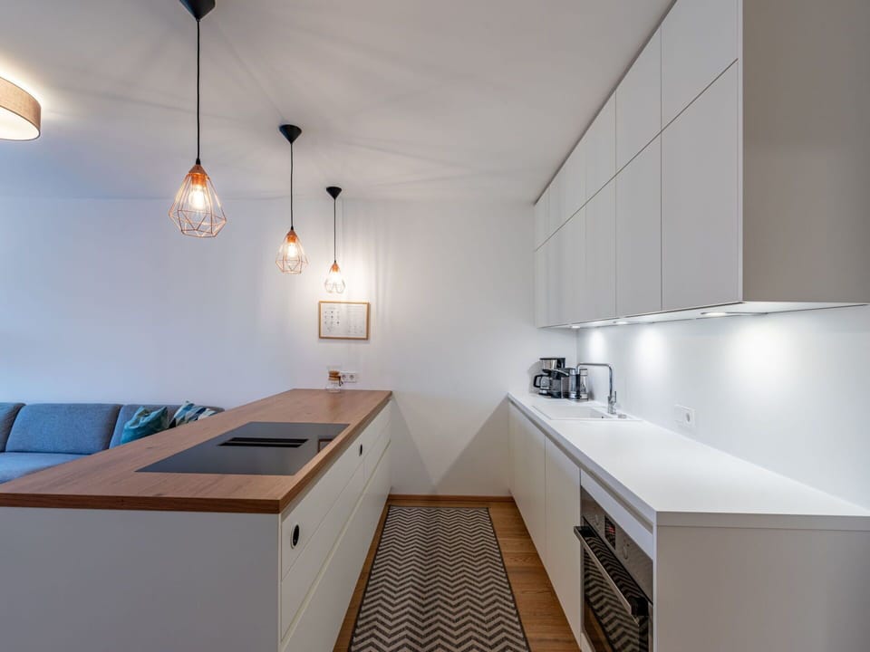 Cabinetry, Interior Design, Flooring, Floor, Wood, Material Property, Kitchen, Table, Ceiling, Automotive Design