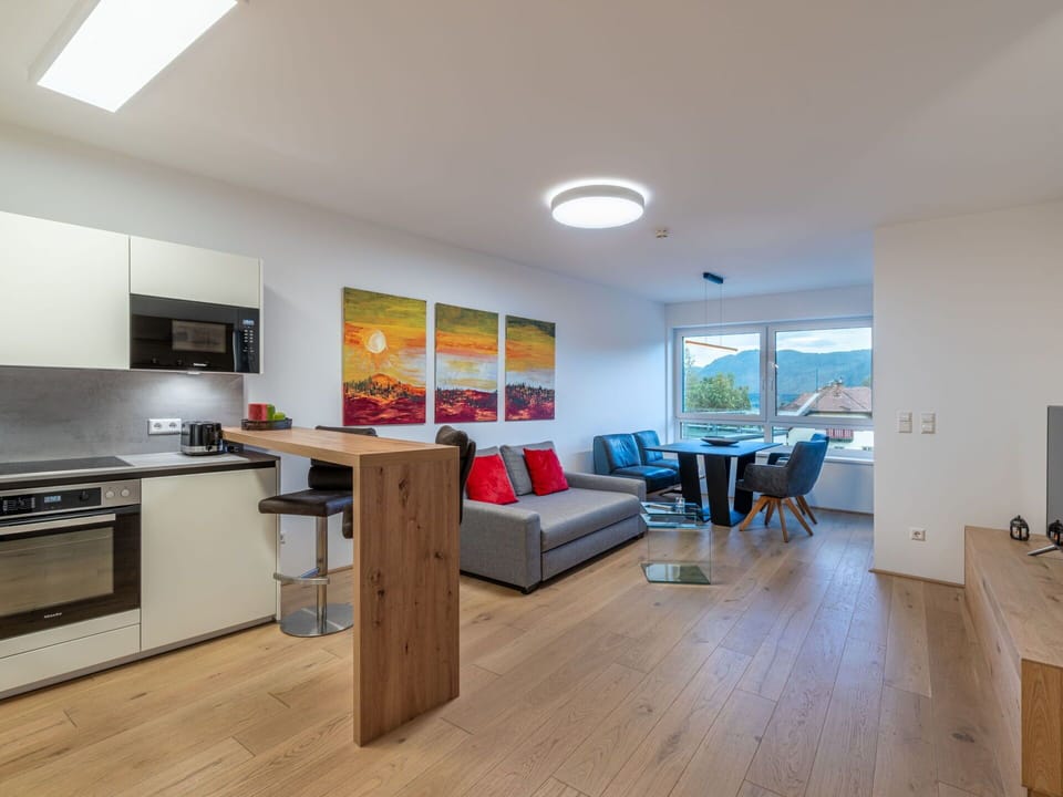 Furniture, Table, Wood, Lighting, Flooring, Chair, Building, Interior Design, Floor, Living Room