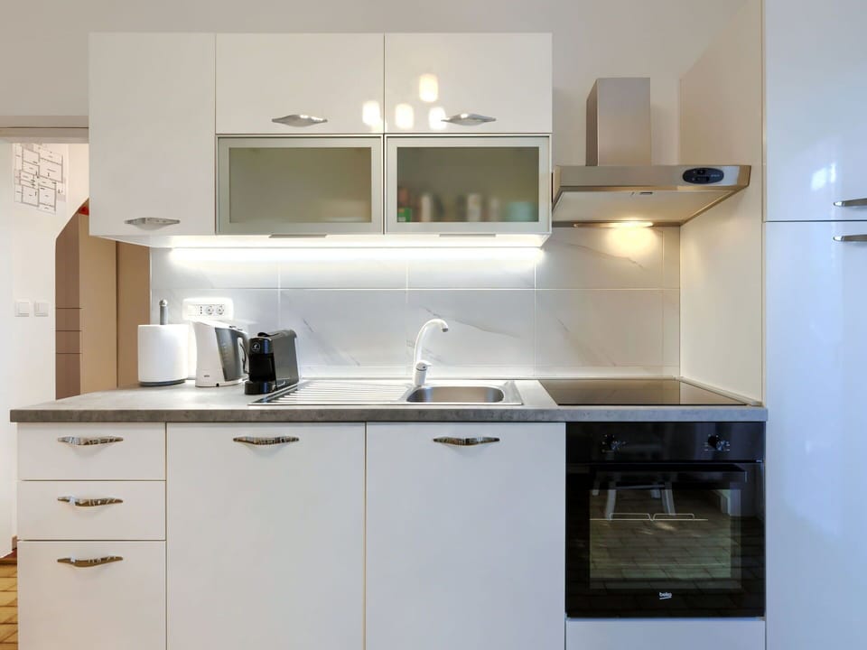 Cabinetry, Property, Kitchen Sink, Furniture, Sink, Countertop, Kitchen Stove, Kitchen Appliance, Kitchen, Interior Design