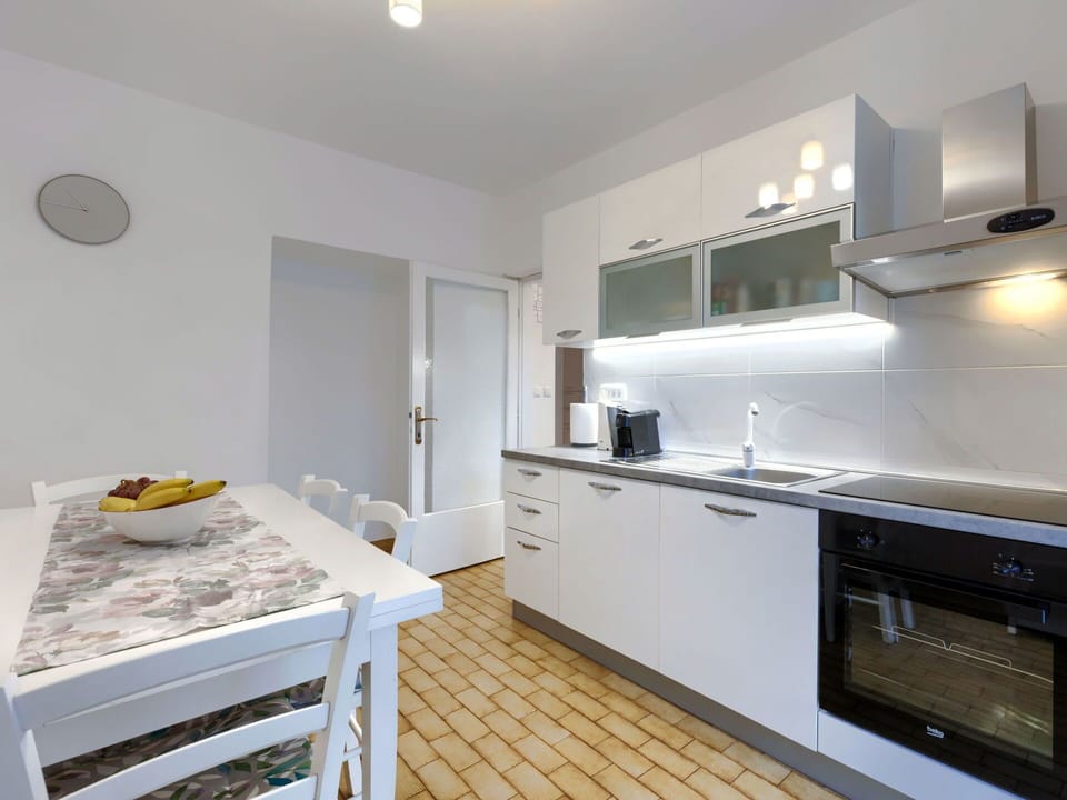 Cabinetry, Furniture, Countertop, Building, Kitchen, Wood, Kitchen Stove, Kitchen Appliance, Flooring