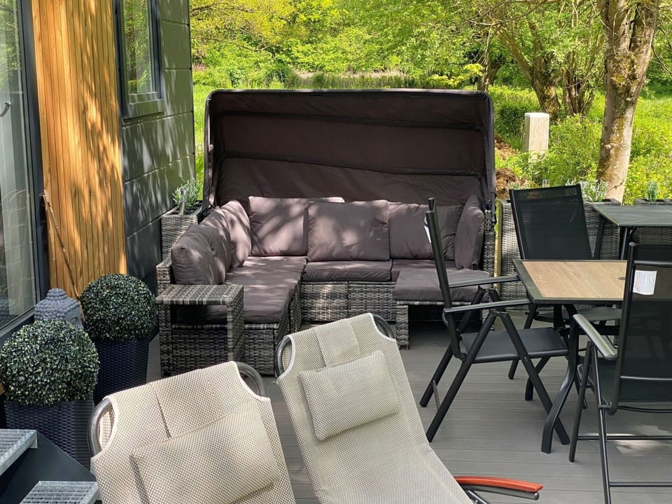 Plant, Furniture, Couch, Outdoor Furniture, Tree, Studio Couch, Shade, Wood, Living Room, Grass