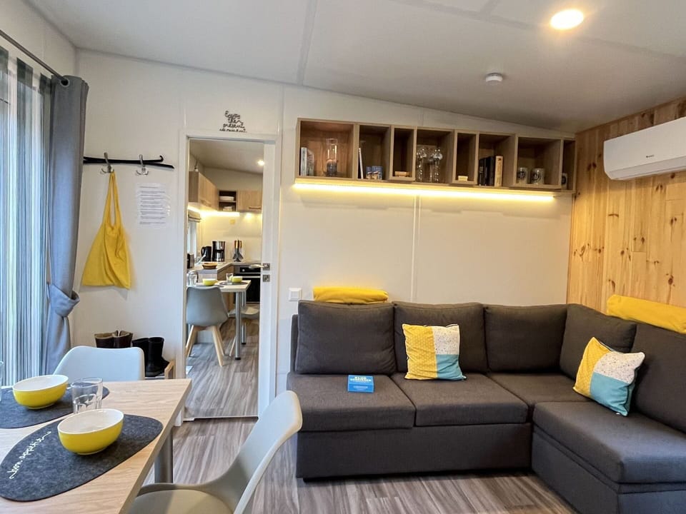 Property, Furniture, Couch, Table, Comfort, Interior Design, Floor, Flooring, Yellow, Living Room