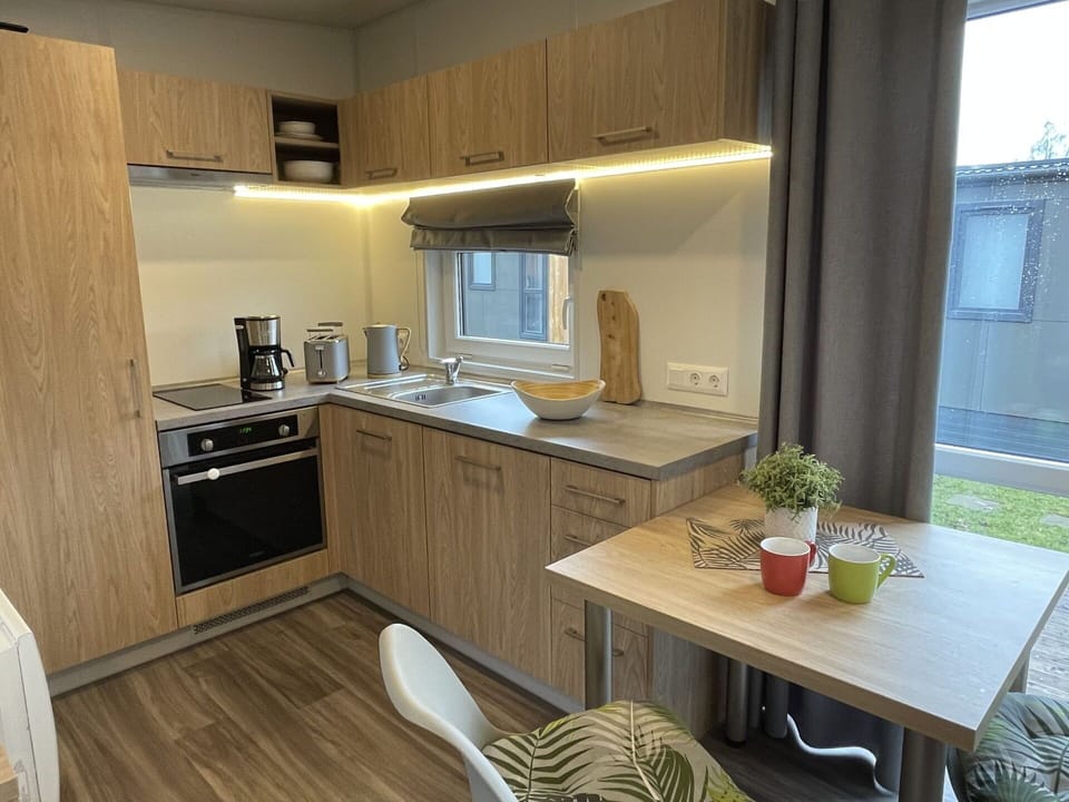 Cabinetry, Countertop, Furniture, Property, Table, Kitchen, Building, Kitchen Appliance, Sink, Interior Design