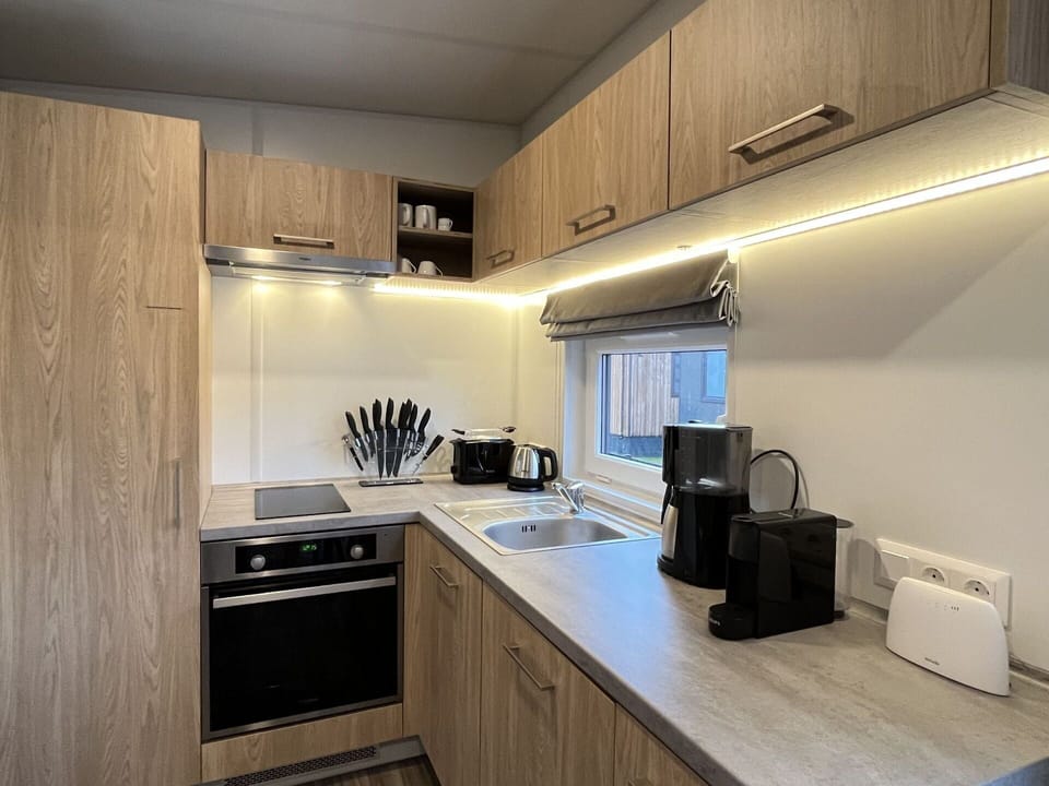 Cabinetry, Countertop, Building, Sink, Kitchen Sink, Kitchen Stove, Kitchen, Kitchen Appliance, Wood, Home Appliance