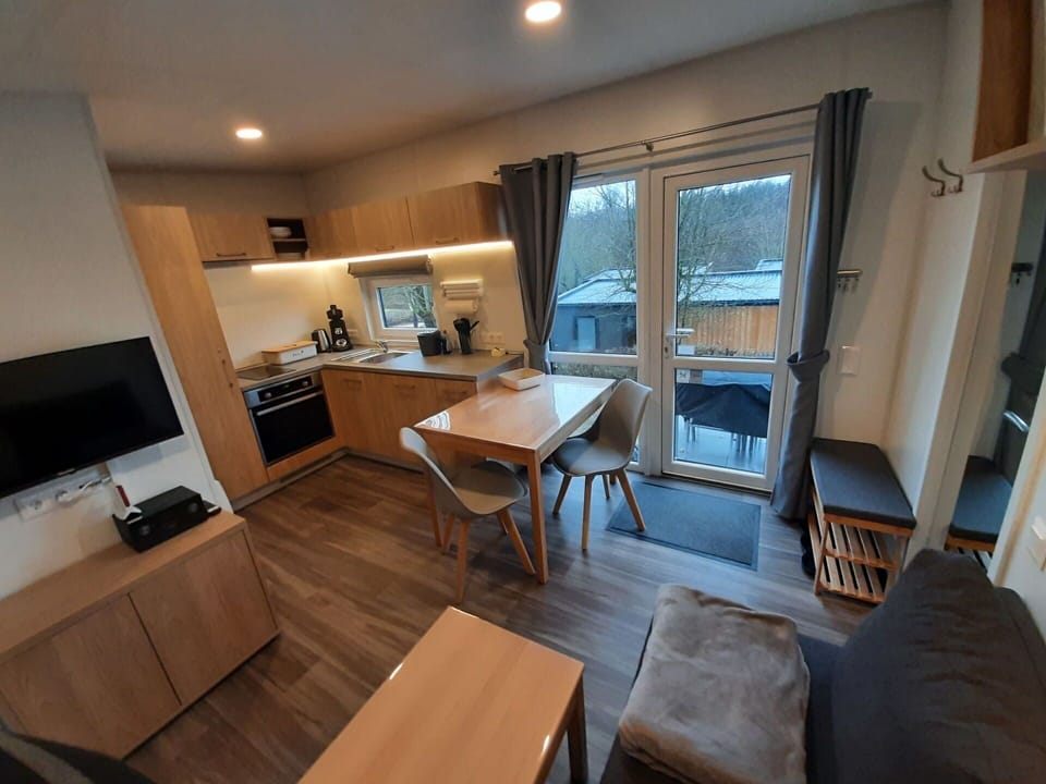 Table, Furniture, Couch, Wood, Cabinetry, Countertop, Interior Design, Chair, Television, Building