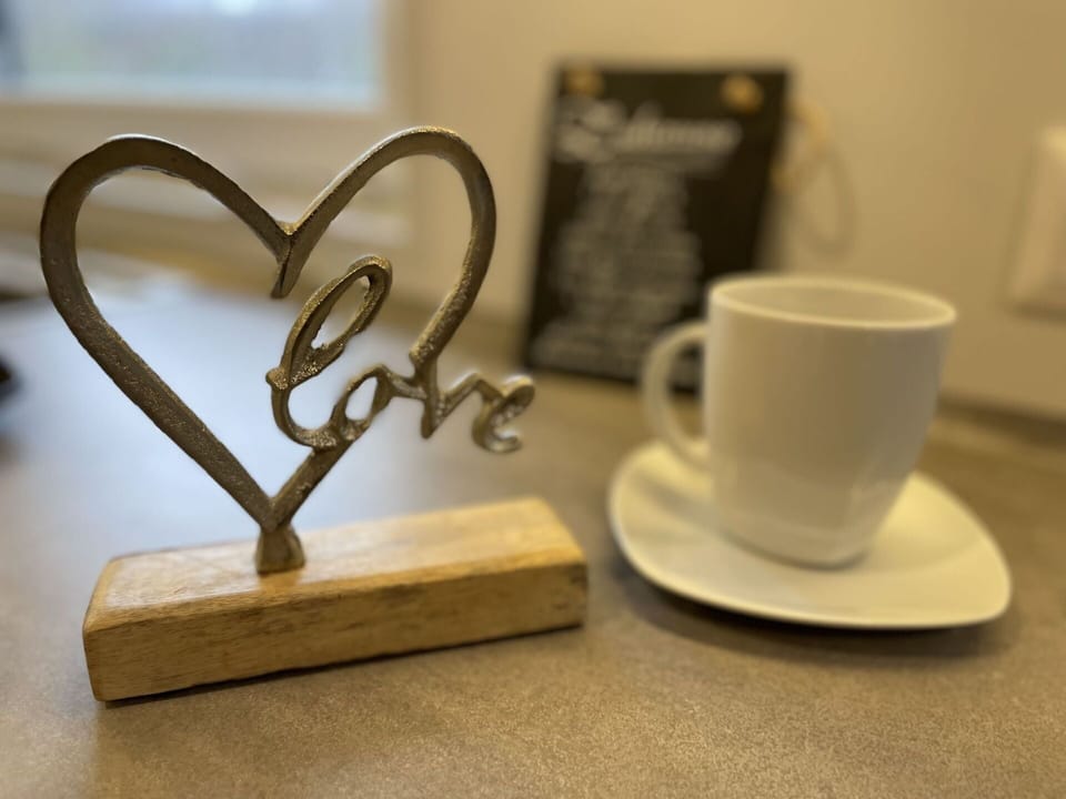 Tableware, Drinkware, Dishware, Cup, Coffee Cup, Serveware, Table, Wood, Font, Rectangle