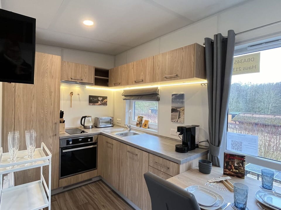Cabinetry, Countertop, Furniture, Kitchen, Wood, Building, Lighting, Sink, Flooring, Floor