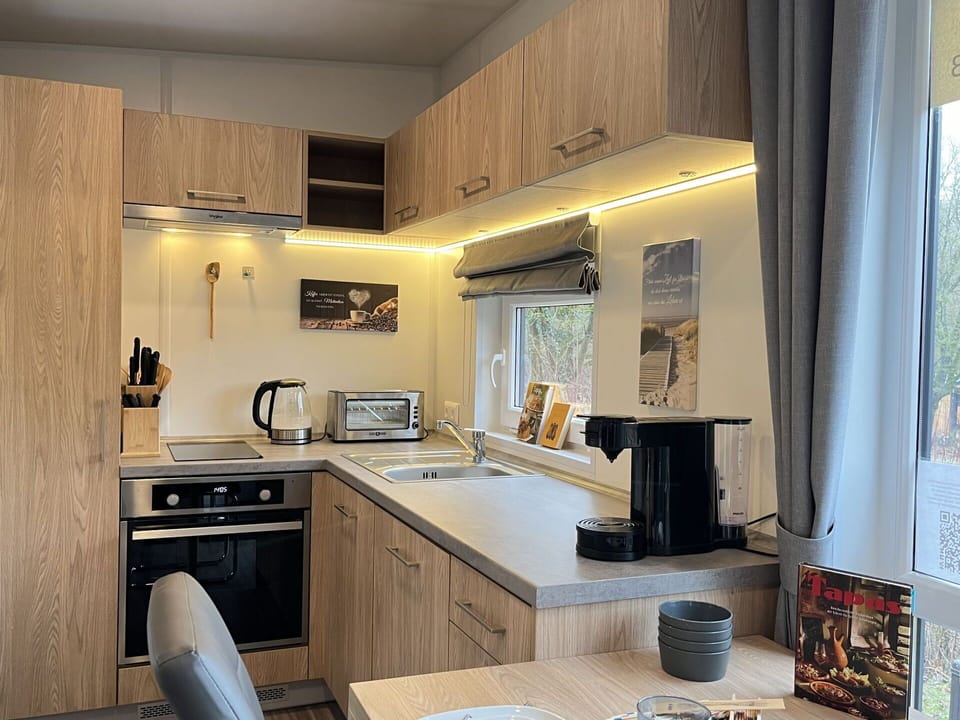 Cabinetry, Property, Countertop, Sink, Kitchen, Kitchen Stove, Kitchen Appliance, Tap, Wood, Home Appliance
