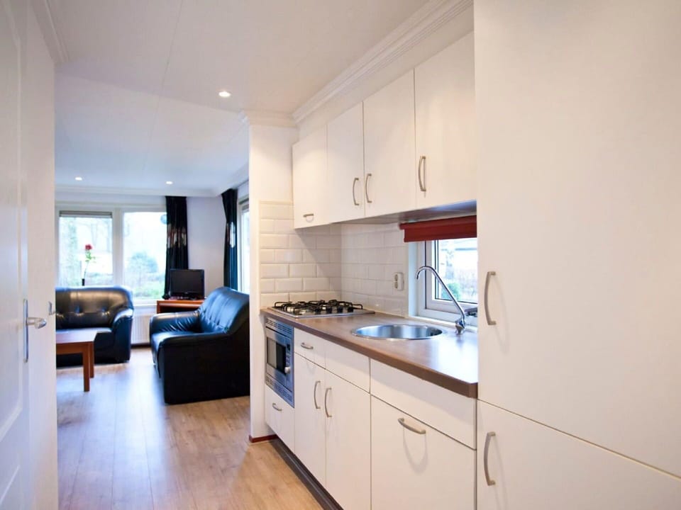 Cabinetry, Furniture, Countertop, Building, Sink, Drawer, Tap, Wood, Floor, Flooring