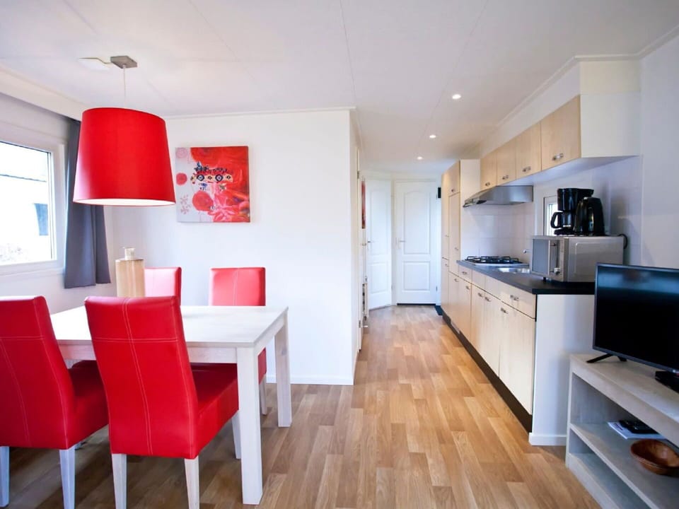 Furniture, Cabinetry, Countertop, Wood, Lighting, Table, Interior Design, Kitchen Appliance, Floor, Window