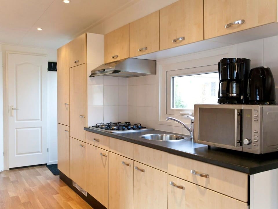 Cabinetry, Countertop, Kitchen Sink, Property, Furniture, Sink, Kitchen Appliance, Building, Kitchen Stove, Kitchen