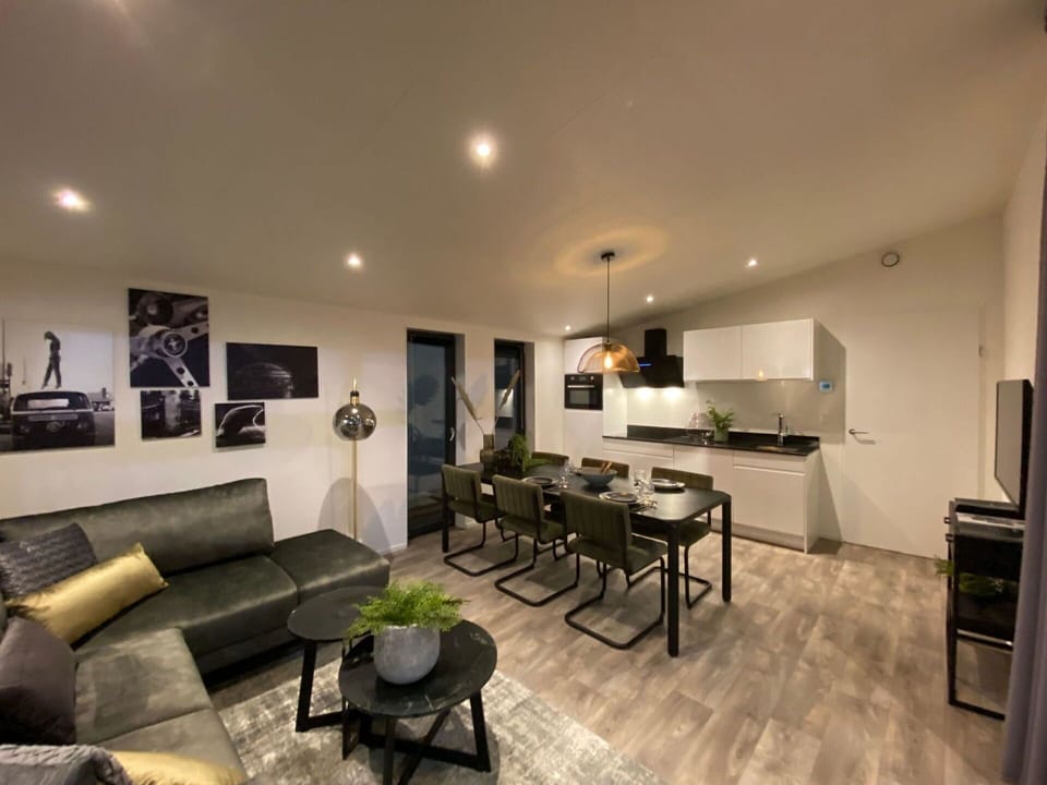 Table, Couch, Furniture, Picture Frame, Interior Design, Living Room, Flooring, Houseplant, Floor, Studio Couch