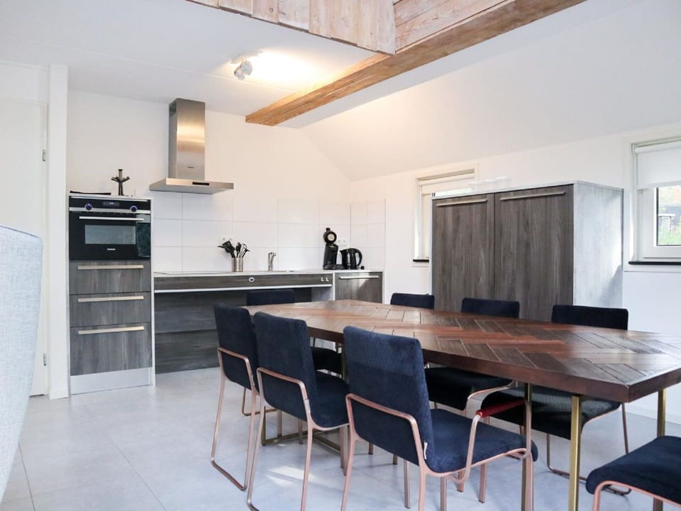 Furniture, Cabinetry, Table, Countertop, Wood, Building, Kitchen, Interior Design, Chair, Flooring