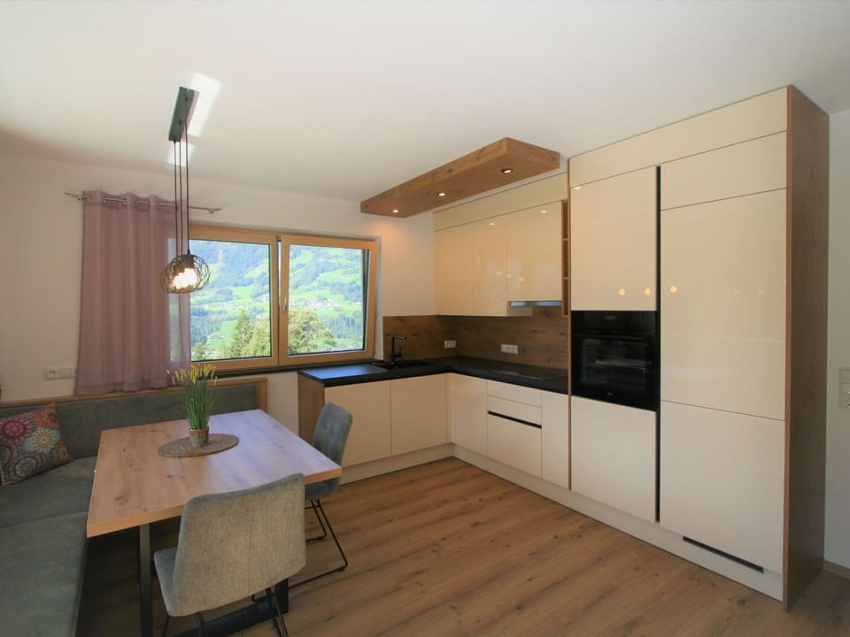 Cabinetry, Furniture, Countertop, Building, Window, Table, Wood, Kitchen, Flooring, Chair