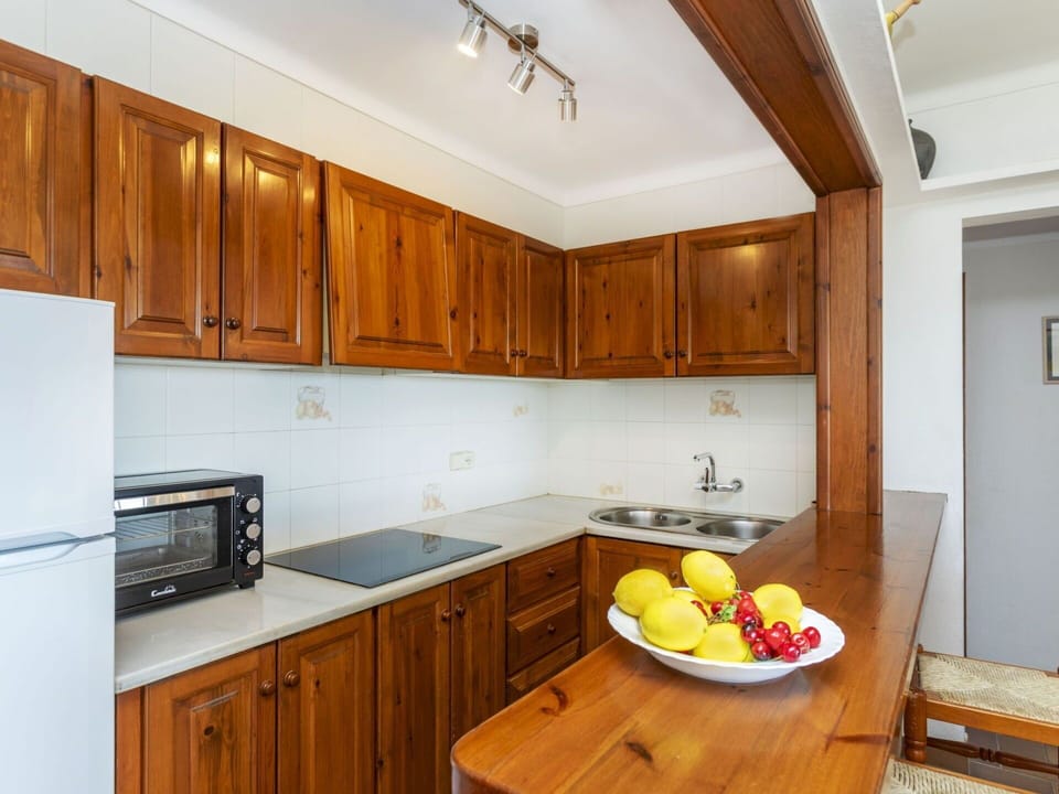 Interior Design, Wood, Cabinetry, Flooring, Kitchen, Countertop, Furniture, Ceiling, Kitchen Appliance, Room