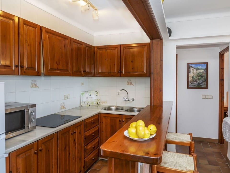 Furniture, Cabinetry, Wood, Countertop, Kitchen, Flooring, Interior Design, Ceiling, Room, Floor