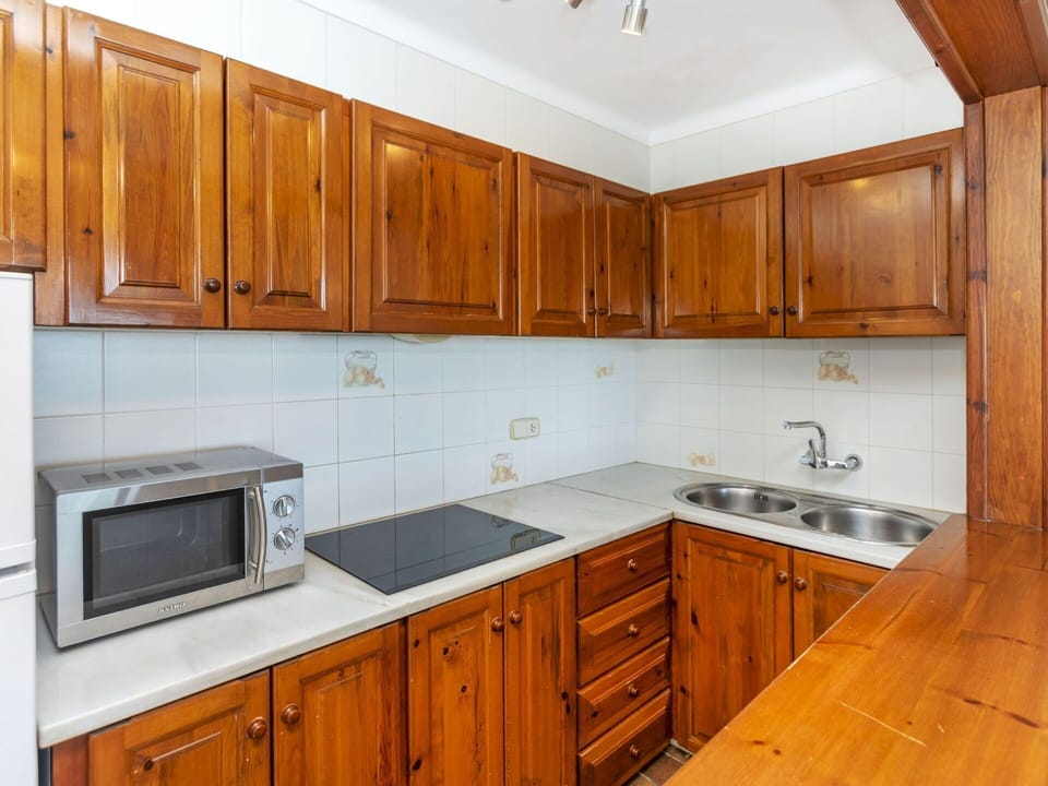 Wood, Cabinetry, Kitchen, Flooring, Major Appliance, Kitchen Appliance, Floor, Interior Design, Countertop, Room