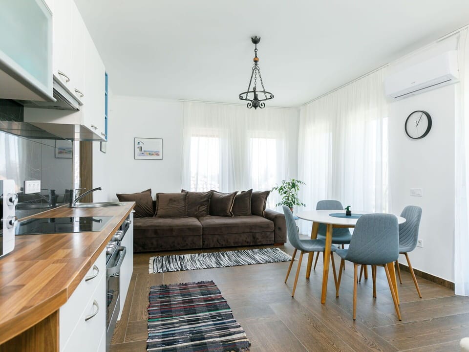 Furniture, Table, Couch, Interior Design, Wood, Lighting, Living Room, Flooring, Cabinetry