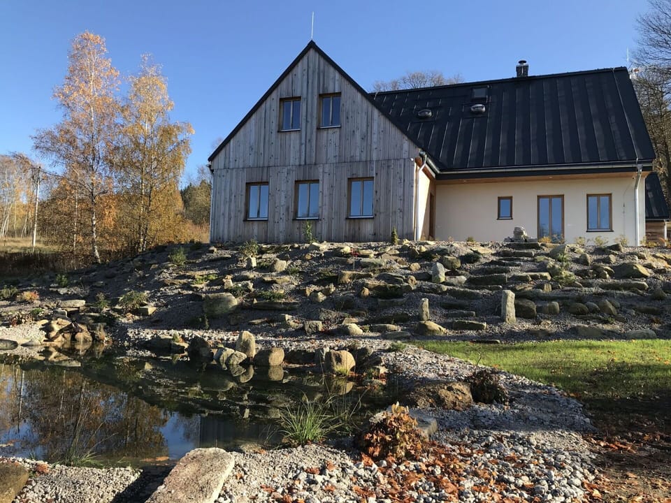 Sky, Plant, Water, Building, Property, Nature, Window, Natural Landscape, Tree, Wood
