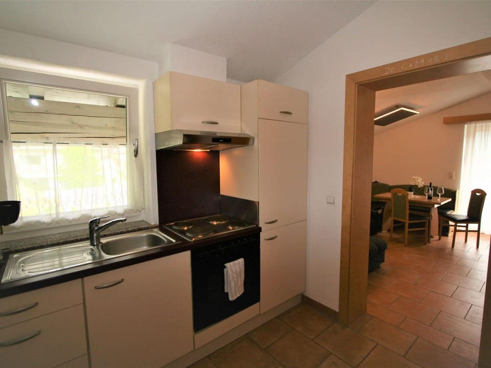 Cabinetry, Building, Countertop, Wood, Kitchen, Kitchen Appliance, Kitchen Stove, Kitchen Sink, Flooring, Floor