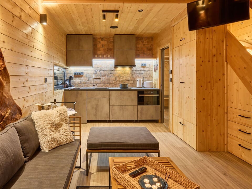 Property, Wood, Couch, Cabinetry, Interior Design, Architecture, Floor, Flooring, Chair, Drawer