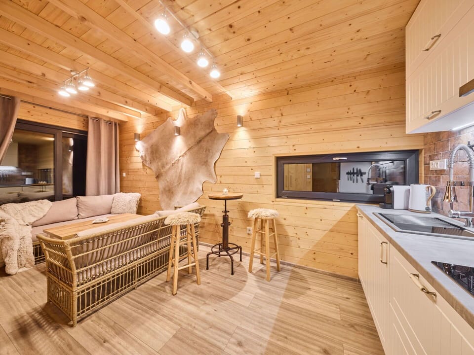 Property, Cabinetry, Wood, Lighting, Countertop, Kitchen Stove, Sink, Interior Design, Kitchen Sink, Flooring