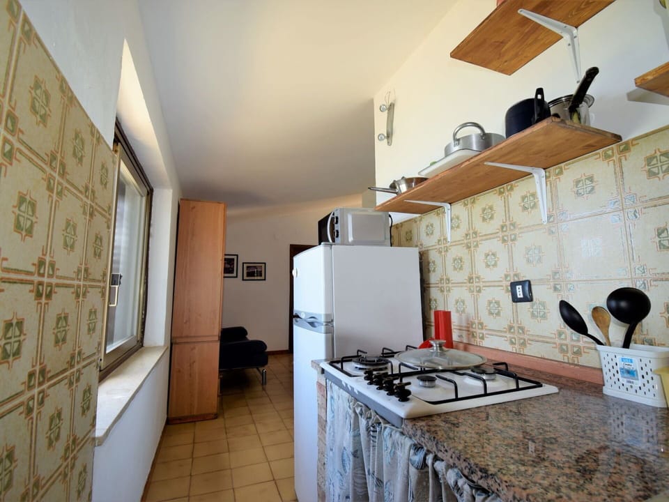 Property, Interior Design, Floor, Wood, Cabinetry, Flooring, Kitchen, Building, Gas Stove