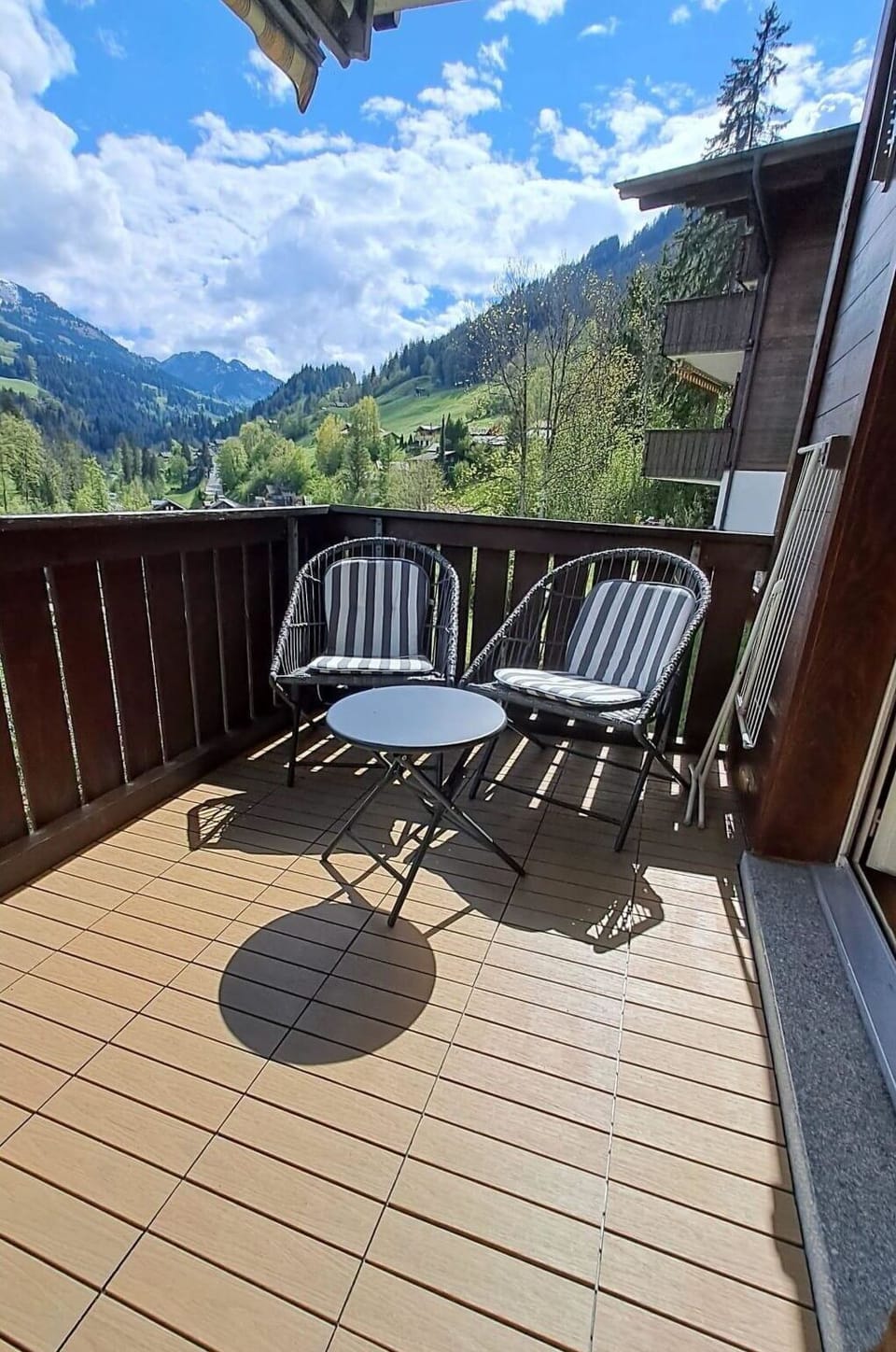 Wood, Furniture, Chair, Hardwood, Wood Stain, Balcony, Outdoor Furniture, Shade, Wood Flooring, Kitchen & Dining Room Table