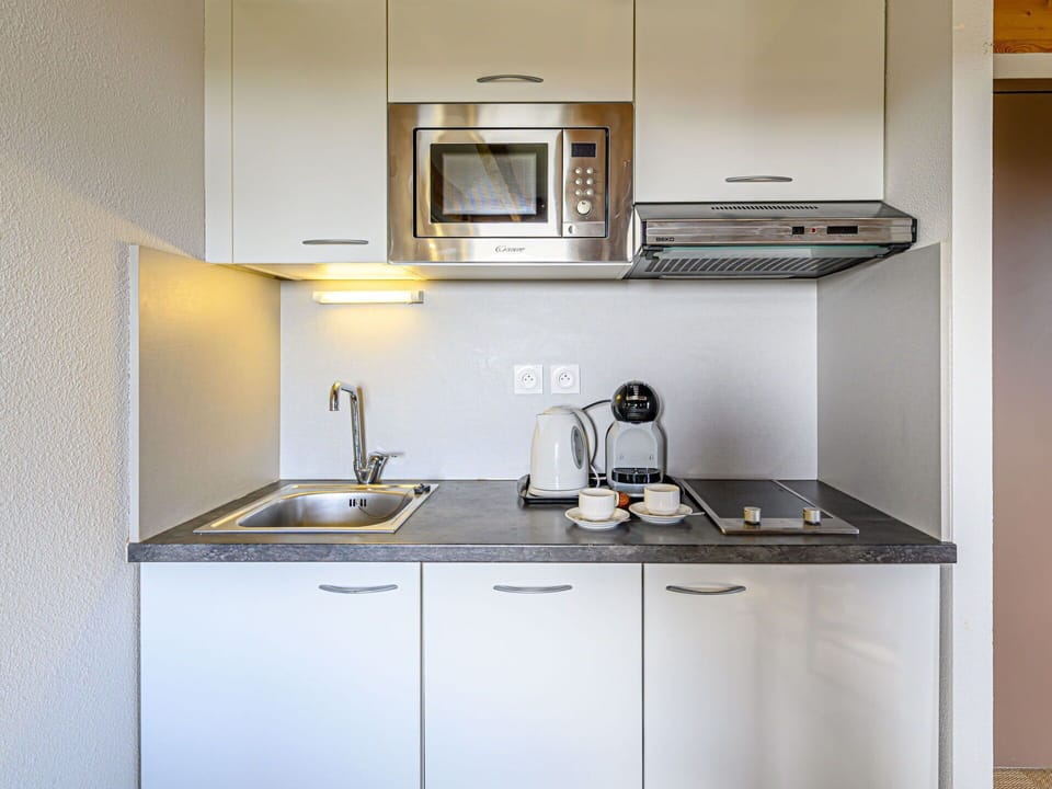 Sky, Property, Furniture, Table, Building, Water, Chair, Wood, Shade, Interior Design