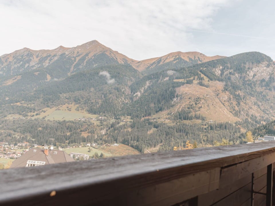 Cloud, Sky, Mountain, Ecoregion, Highland, Asphalt, Road Surface, Slope, Tree, Landscape