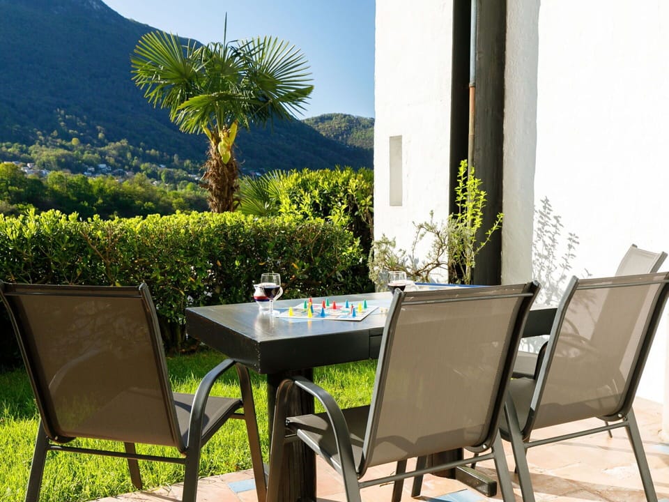 Table, Furniture, Property, Chair, Plant, Shade, Leaf, Building, Outdoor Table, Outdoor Furniture