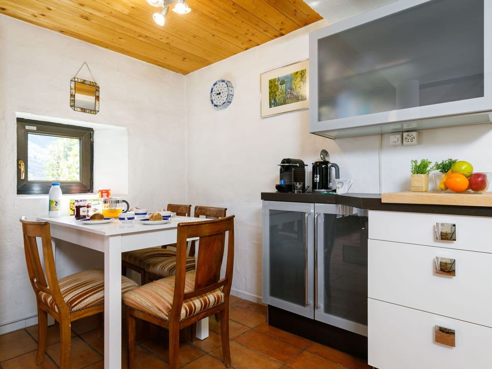 Property, Cabinetry, Furniture, Picture Frame, Table, Lighting, Kitchen Appliance, Wood, Interior Design, Orange