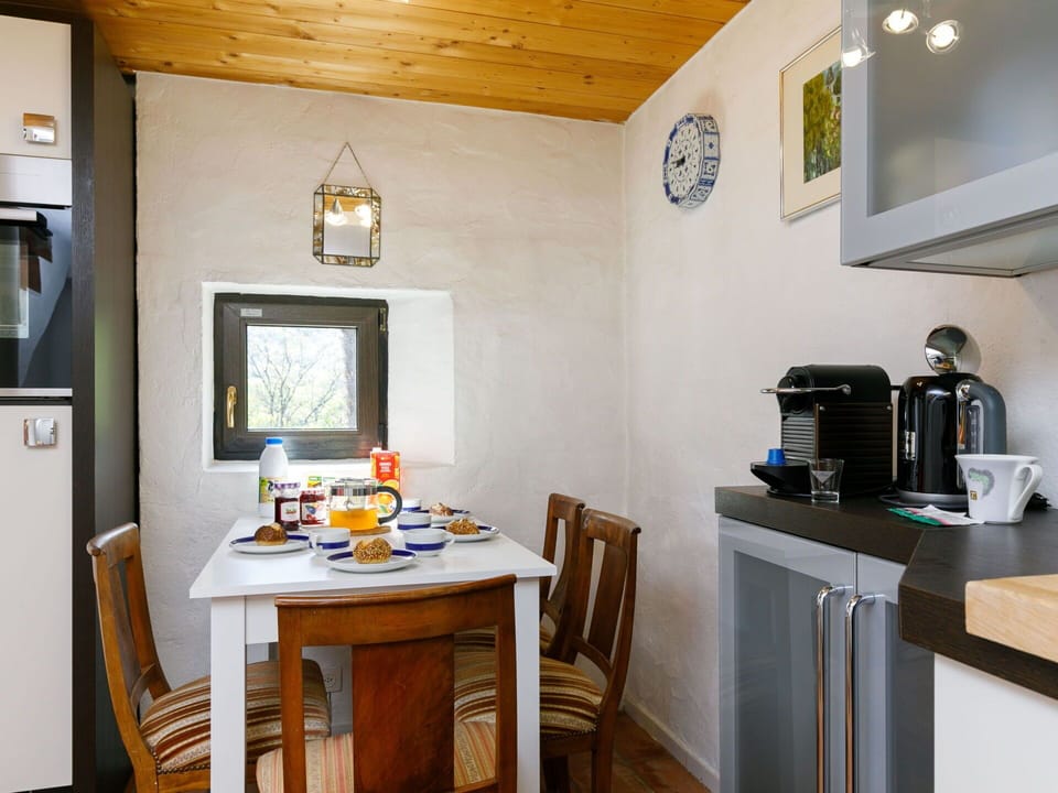 Property, Furniture, Picture Frame, Wood, Table, Interior Design, Kitchen Appliance, Floor, Coffeemaker, Flooring