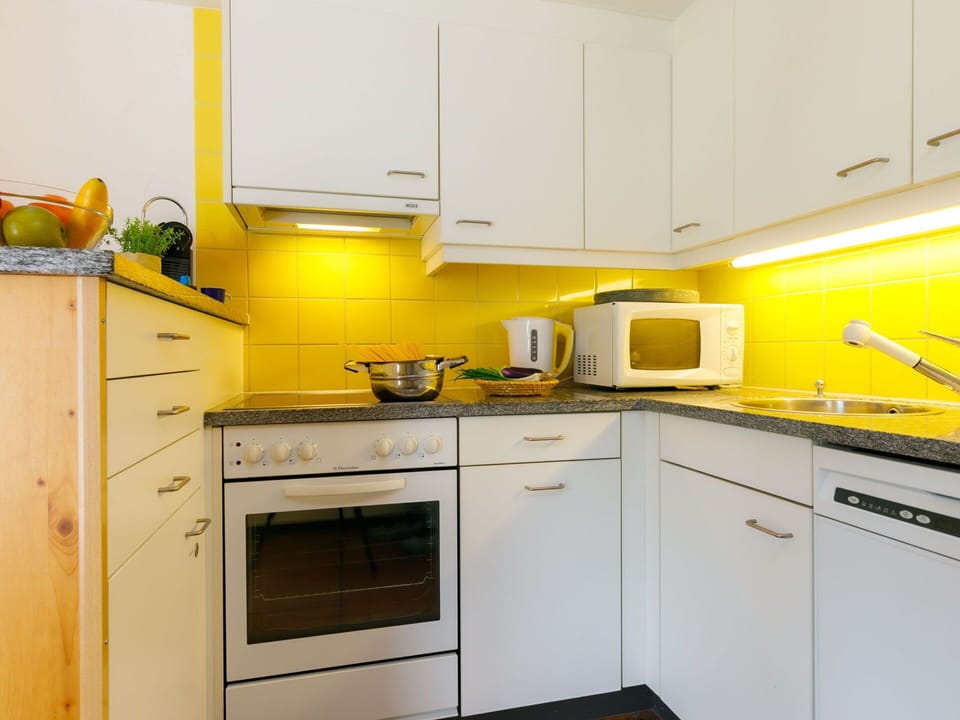 Cabinetry, Property, Countertop, Kitchen Appliance, Kitchen Stove, Home Appliance, Kitchen, Building, Interior Design, Wood