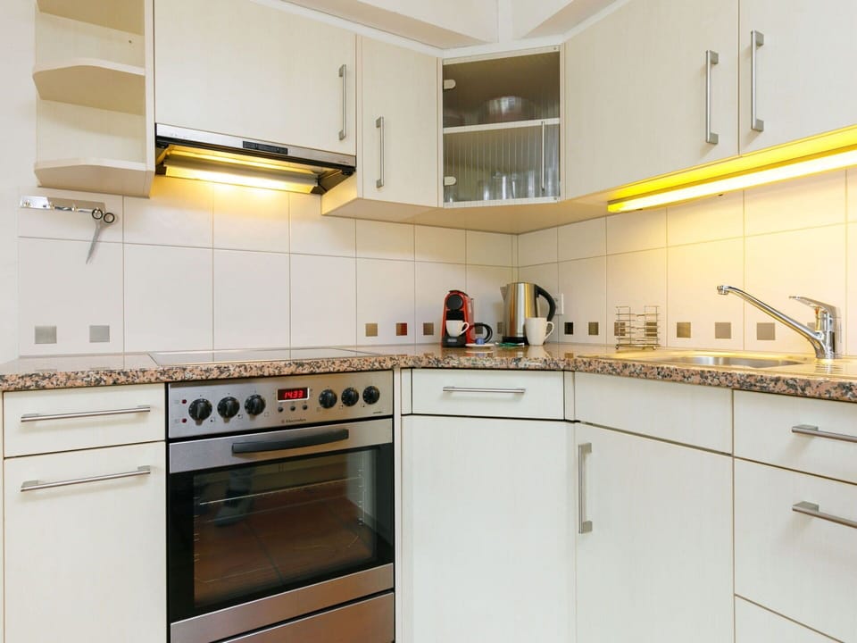 Cabinetry, Furniture, Countertop, Building, Kitchen Appliance, Kitchen Stove, Kitchen, Wood, House, Home Appliance