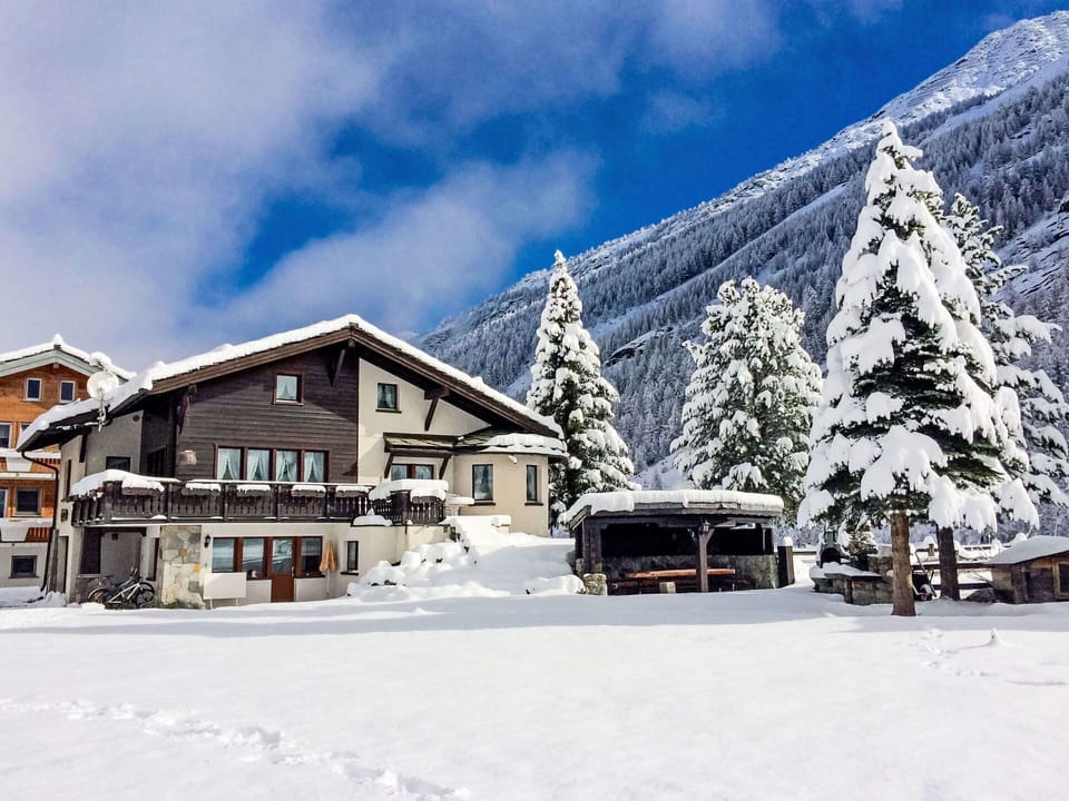 Cloud, Sky, Snow, Building, Mountain, Tree, House, Slope, Vehicle, Landscape