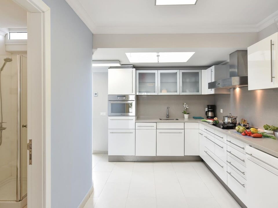 Countertop, Cabinetry, Furniture, Building, Kitchen Appliance, Kitchen Stove, Tap, Kitchen, Wood, Drawer