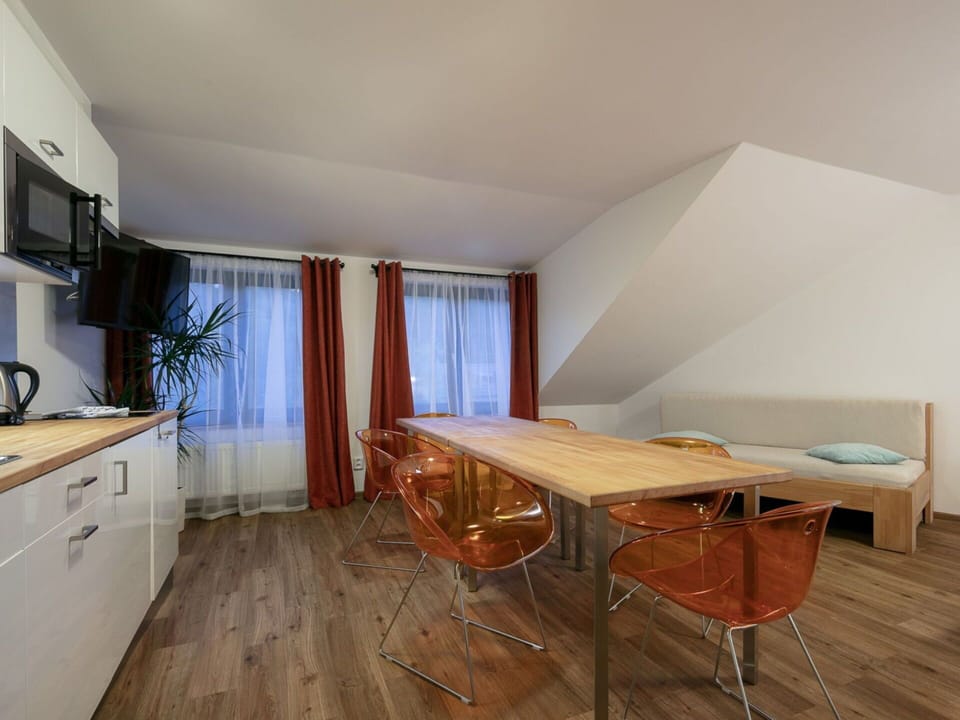 Property, Cabinetry, Furniture, Table, Building, Wood, Chair, Plant, Houseplant, Window